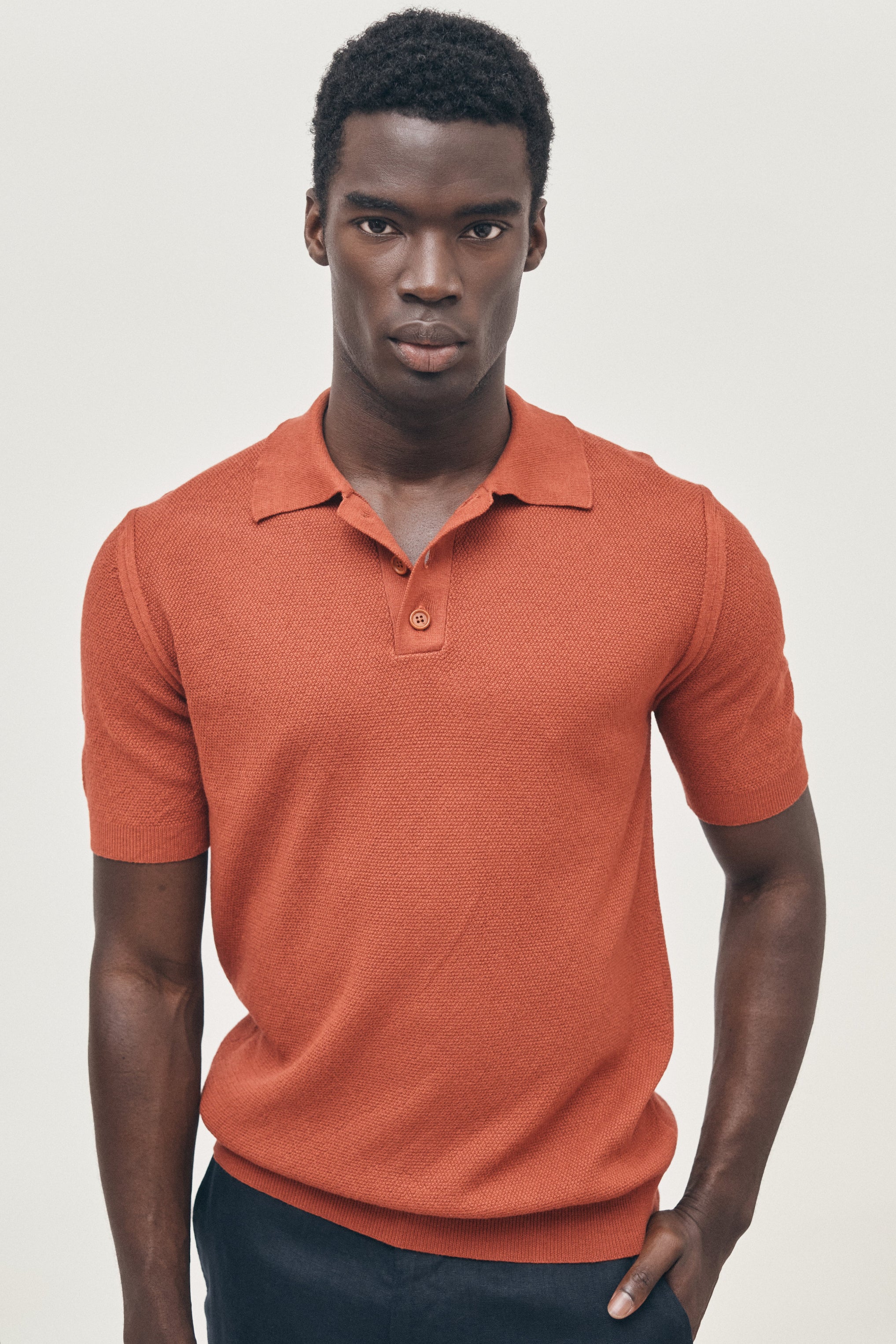 Burnt orange knitted polo