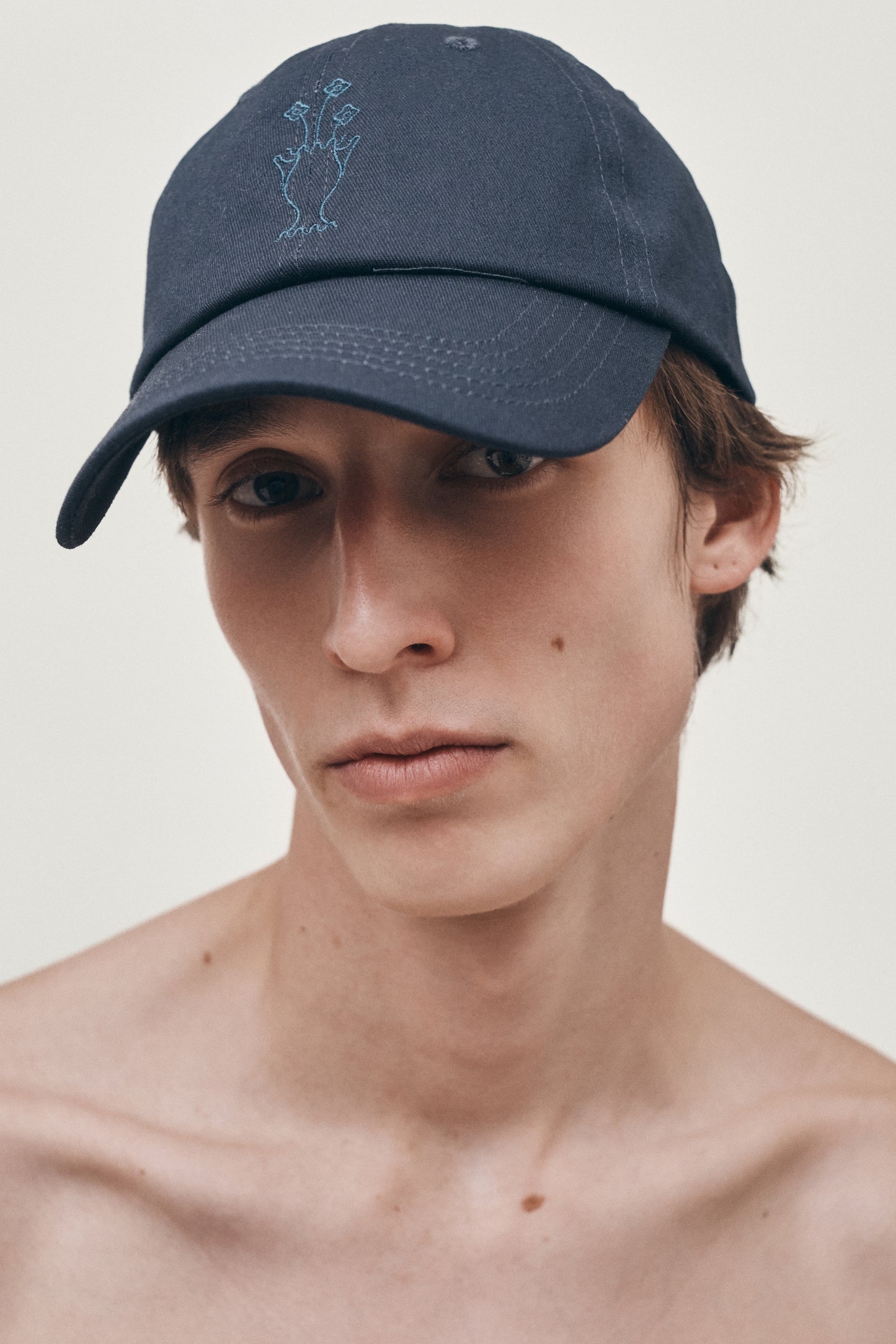 Ornate vase unstructured hat